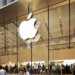 Exterior view of Apple office building featuring the iconic glowing white apple logo, highlighting the comprehensive guide to Apple internships and providing valuable insights for aspiring applicants.