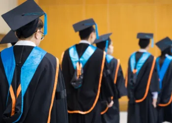 Graduating Master students with caps, symbolizing success in MS journey for IIT BTech holders in the US.